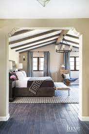 An Outdoor Living Area In The Entrance Courtyard Gives The Homeowners A Relaxing Spot To Enjoy The Gardens Spanish Style Bedroom Luxe Bedroom Colonial Bedroom