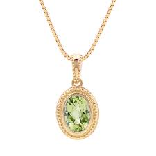 When set in gold, this gem was said to protect the wearer from nightmares. Oval Peridot Pendant In 14k Yellow Gold 18 In Shane Co