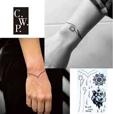 The armband tattoo goes by many different names. Bh1706 1 Stuck Einfache Armband Schwarz Linie Tattoo Mit Blume Wrist Strap Mandela Muster Temporare Tattoo Fur Hande Aufkleber Temporary Tattoo Line Tattoopattern Tattoos Aliexpress