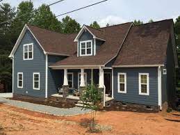 Blue big scary house with a brown roof. Exterior Paint Colors For House With Brown Roof 11 Exterior Paint Colors For House House Paint Exterior House Exterior Blue