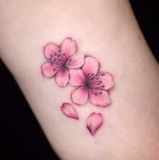 50 Amazing Wrist Tattoos For Men Women Tattooblend Wrist Tattoos For Guys Blossom Tattoo Wrist Tattoos Girls