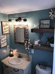 This look is especially good for small bathrooms, where the scheme injects plenty of personality without overwhelming the space. Top 12 Best Bathroom Wall Decor Ideas Bathroom Decor Small Bathroom Decor Farmhouse Bathroom Decor