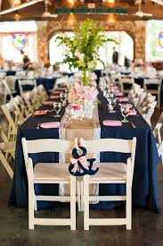 navy blue tablecloth with pink napkin 