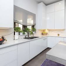 What S Your Style Modern Or Traditional We Like The Modern Take On This Kitchen With All Push Latch Doors And Draw Kitchen Speciality Cabinets Kitchen Design
