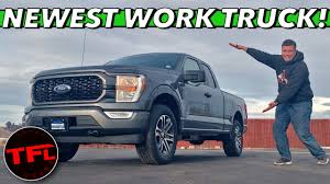 The rear seat area has a flat floor for cargo and an optional locking underseat area for storing. Video 2021 Ford F 150 Xl 4x4 Are Simple Trucks Getting Too Expensive The Fast Lane Truck