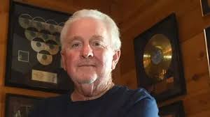 Larry Bastian dead: Legendary songwriter who worked with Garth Brooks dies 