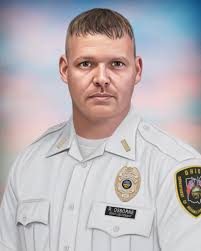 This portrait was commissioned by the men and women who worked along side  of Lieutenant Rodney Osborne. On Tuesday, Lieutenant Rodney Osborne was  conducting firearms training at the Corrections Training Academy in