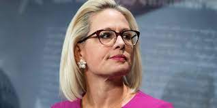 Kyrsten sinema is a successful american politician and has almost become synonymous with sleeveless, tight dress and thick frame glasses. this united stats senator is one gorgeous woman who likes to highlight her curvy figure with colorful garments. Sinema Called Jan 6 Commission Critical But Missed The Senate Vote