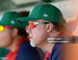 Adam Wilk of the Detroit Tigers pitches while wearing a green jersey...  News Photo