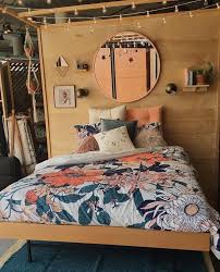 Boho Bedroom With Orange And Navy Blue Floral Bedding With Rose Gold Accents Rose Gold Bedroom Boho Bedroom Urban Bedroom