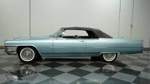 Image result for Starlight Silver 1965 Cadillac