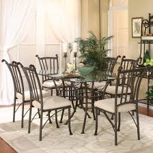 Merge formal and contemporary elements with a table featuring rich walnut and cherry surrounding framing and chocolate leather seats. Cramco Inc Denali 72095 42 2x47 6x01 7 Piece Rectangular Glass Table With Chairs Lapeer Furniture Mattress Center Dining 7 Or More Piece Set