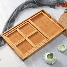 Place the remaining items on your table neatly inside the tray. China Large Nesting Serving Wooden Trays For Breakfast Coffee Table Food Desk Organizer China Bamboo Flatware Holder And Cutlery Tray Price