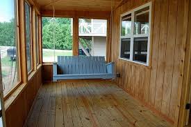 Mixing patterns and textures in shades of blue and white adds rhythm and texture throughout the seating area. Lots Of Time To Swing On The Screened Front Porch Picture Of Oak Point Lodges Hammond Tripadvisor
