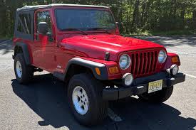 Image result for Flame Red 2005 Jeep