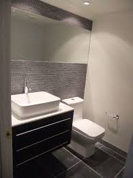 Bathroom layouts can be challenging, but a small bathroom can be particularly challenging. Grey Modern Small Half Bathroom Ideas Trendecors