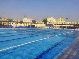 صور الجمل يفتتح حمام السباحة بمركز شاب العبور عقب تجديده العصر نيوز Outdoor Decor Outdoor Pool