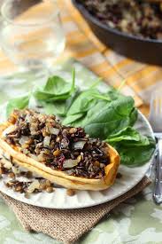 Wild Rice Lentil Cranberry Stuffed Delicata Squash Recipe Food Wild Rice Vegan Main Dishes