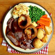 On christmas day in america, you'll find ham and scalloped potatoes on the table. Roast Beef With Onion Gravy And Mustard Yorkies Roast Beef Dinner Roast Dinner Recipes Roast Beef Recipes