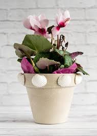 #2) large diy flower pot tower. Cute Ways To Decorate Plant Pots The Inspiration Edit