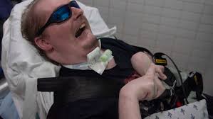 15 years after paralysis, local man experiences baptism