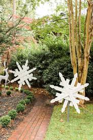 Diy Snowflake Yard Decoration The Home Depot Blog Outdoor Christmas Decorations Yard Outdoor Christmas Christmas Yard Decorations