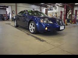 Image result for Dark Ming Blue 2004 Pontiac