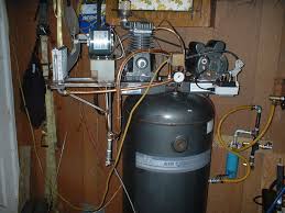 Homemade silent air compressor constructed from a pair of freon tanks, a refrigerator compressor, a pressure switch, and a regulator. Diy Dirt Cheap Shop Compressor Intercooler