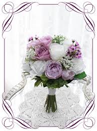 Each silk rose bud is supported by a stem, and beautifully accented with baby's breath. Carrie Bridal Flower Package Artificial Bridal Bouquets Silk Wedding Flower Packages Flowers For Ever After