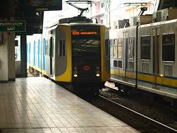 Manila lrt line 1 lrt cars 1005+1006 lrt approaching. After Train Breakdown Lrt 1 Passengers Walk Along Rail Tracks