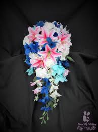 Check out our silk tiger lily wedding selection for the very best in unique or custom, handmade pieces from our shops. Dress My Wedding Navy And Tiger Lily Cascading Bouquet