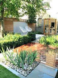 Landscape designers a blade of grass reconfigured the back porch to step down to an adjacent raised bluestone patio. Front Lawn Ideas No Grass Beautiful No Outdoor Gardens Design Small Backyard Patio Backyard Ideas For Small Yards