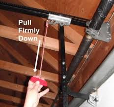Typically it is in the top panel. How To Manually Open A Garage Door