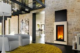 Anche bubble è possibile acquistarlo in una versione a parete più adatta ad ambienti di dimesioni ridotte, creando ugualmente quell'atmosfera che solo il contatto diretto con la fiamma può dare. Camini Moderni O Camini Rustici Foto Rivestimento Camino Moderno
