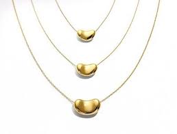 Tiffany & co, elsa peretti bean collection yellow gold 18kt, weight 37.2gr the bean represents the origin of all things. Elsa Peretti Bean Pendant From Tiffany Co The Bean Represents The Origin Of All Things Elsa Peretti Platinum Chain Tiffany Necklace