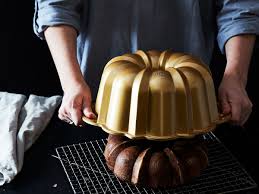 Mix sugar, cinnamon and nuts in a separate bowl. The History Of The Bundt Cake Pan An American Tradition Nordic Ware