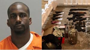 Man arrested after heroin, marijuana, stolen firearms seized