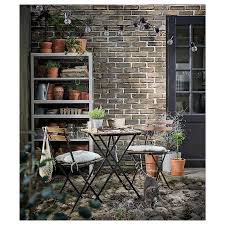 Ikea runnen floor decking, outdoor grey 0.81 m2 floor decking makes it easy to refresh your terrace or balcony. Tarno Table 2 Chairs Outdoor Black Acacia Gray Brown Stained Light Brown Stained Steel Ikea Staining Wood Ikea Steel Lighting