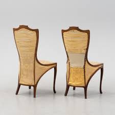 A pair of mahogany art nouveau chairs by Edward Colonna for Samuel Bing,  Paris, early 20th Century.