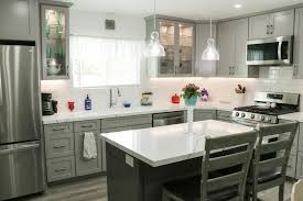 Dark wood and gray cabinets kitchen design. Nipomo Ca Kitchen Remoding Contractor