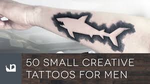 Two small flowers on an ankle tattoo. 50 Small Creative Tattoos For Men Youtube