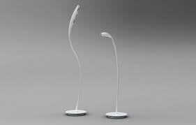 Doride Floor Lamp By Artemide The Leaf Is Is A Stroke Of A Pen A Soft Vertical Wave In Flux A Fluid Gesture That Changes Floor Lamp Artemide Lighting Lamp