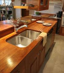 If you need an uneven number of boards to cover the depth of your countertop, make sure it's the board closest to the wall you rip down to the right width, not the front board. 10 Hidden Benefits Of Wood Countertops