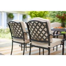 Hampton Bay Laurel Oaks 7 Piece Brown Steel Outdoor Patio Dining Set With Cushionguard Putty Tan Cushions 525 0200 000 The Home Depot Patio Dining Set Outdoor Furniture Sets Outdoor Dining Set