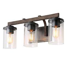 Rustic farmhouse style bath vanity lights: Laluz Rustic Bath Vanity Light Fixture Wall Sconces With Clear Glass Shade Faux Wood 3 Sources Buy Online In Guatemala At Guatemala Desertcart Com Productid 93012115
