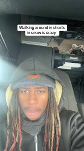 Sitting in Snow in Shorts