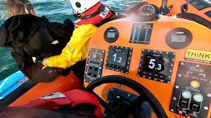 Watch: Paddleboarder rescued 1.5 miles off Dorset shore