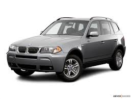 Working at back of valve cover, squeeze breather hose release tabs and pull off valve cover. 2006 Bmw X3 Ats Complete Auto Repair