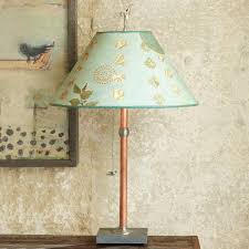 This bedside lamp with dimmer makes the transition from morning to evening a little more pleasant. Red Bird Table Lamp Sundance Catalog