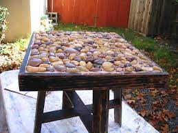 The dana coffee table is the perfect balance between intricate pattern and organic lines. Rustic Inlaid Stone Side Table Hgtv